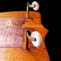 Castor Detail: note wooden wheels and bent-pin axle